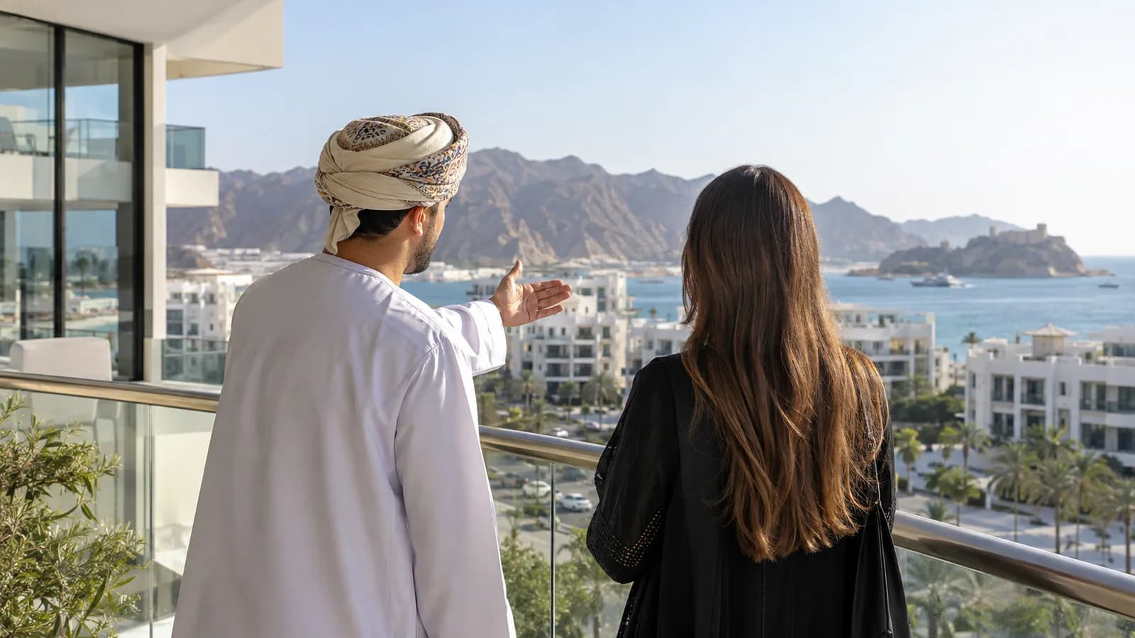 Property agent and buyer viewing a Muscat residence
